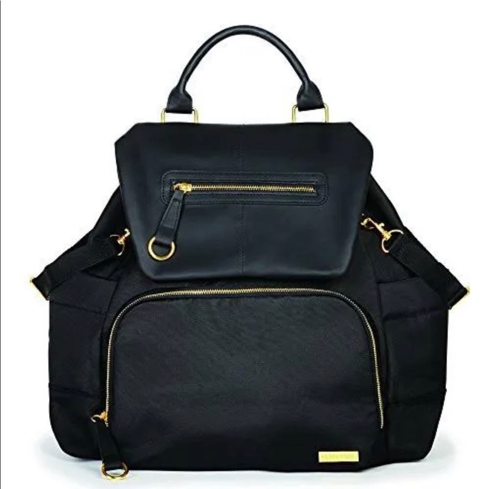 Add polish with the Chelsea Diaper Backpack with side bottle pockets + m…